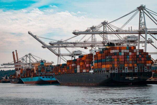 Freight containers loaded on a cargo ship, representing growing transit trade through Gwadar Port