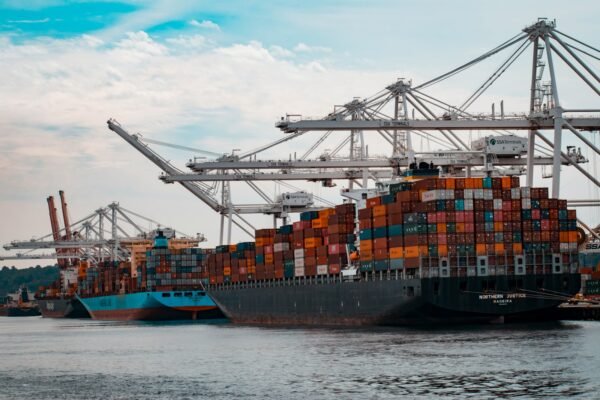 Cargo containers loaded on a ship, illustrating port trade activity relevant to CPEC and Gwadar Port