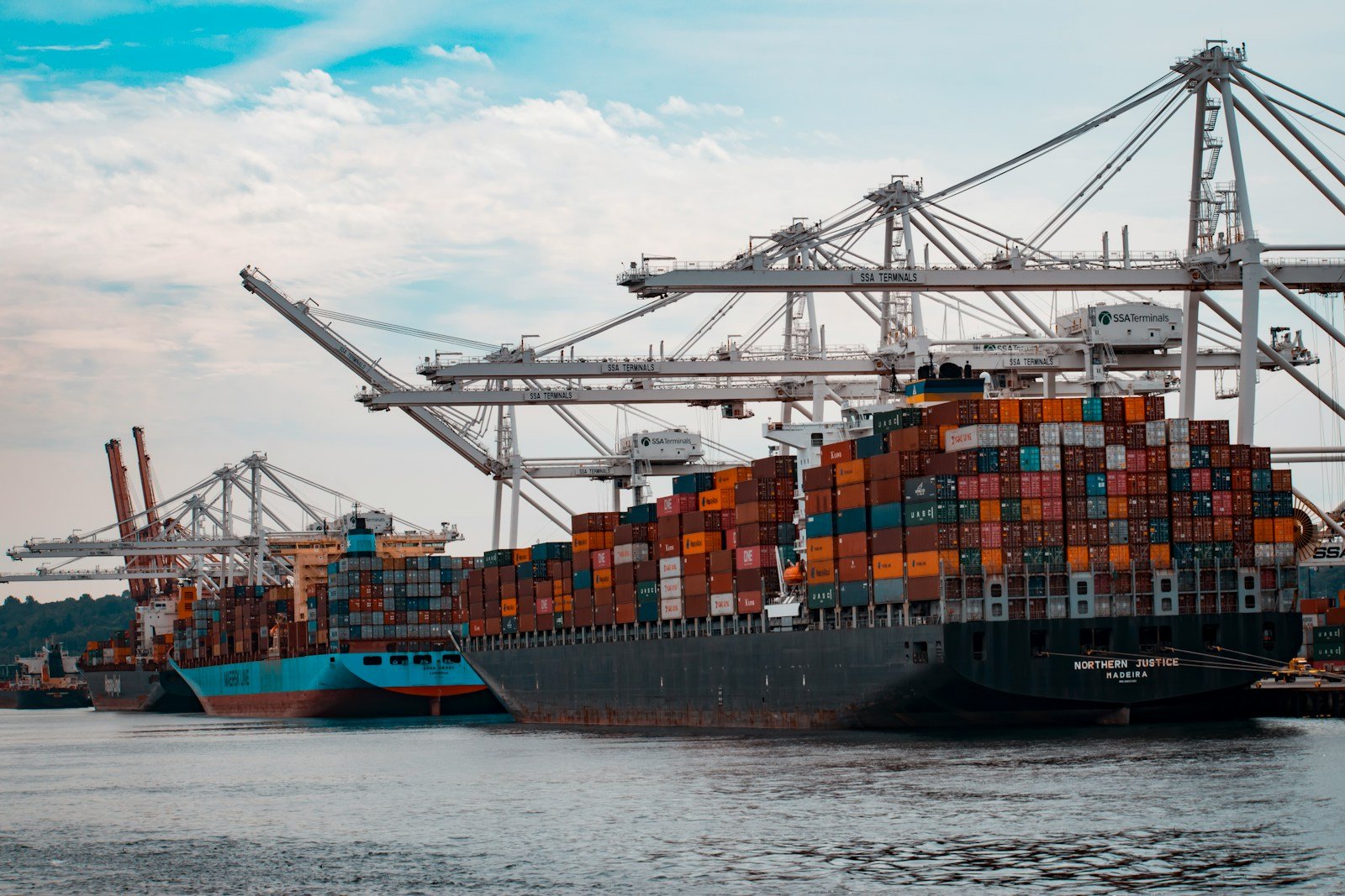 Cargo containers loaded on a ship, illustrating port trade activity relevant to CPEC and Gwadar Port