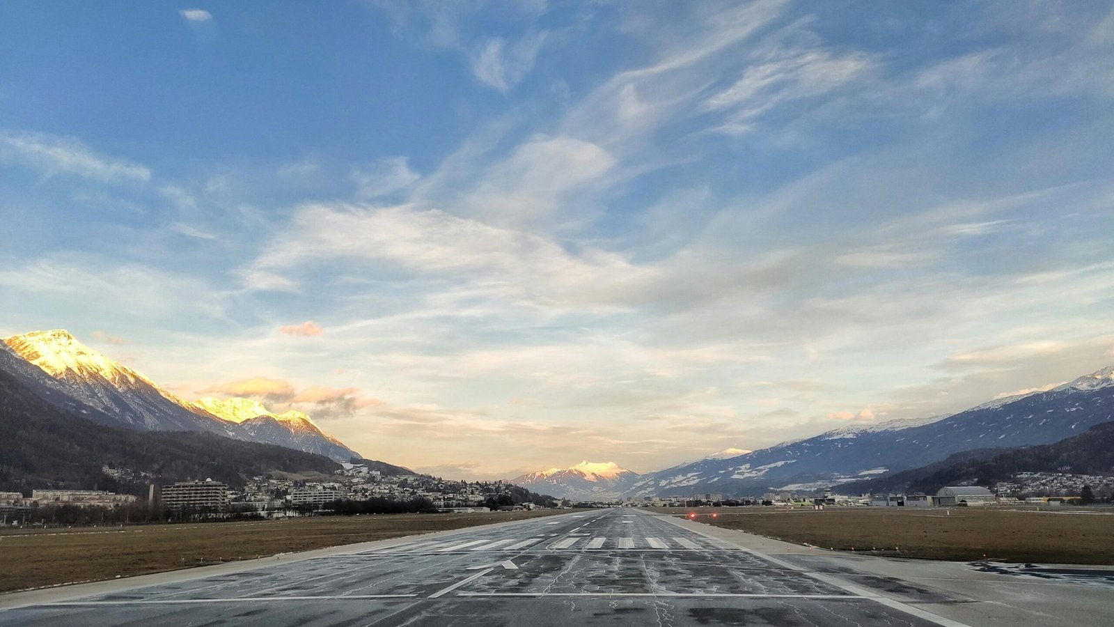 Empty runway with mountains in the background, representative image for New Gwadar International Airport, the endpoint of East Bay Expressway Phase II