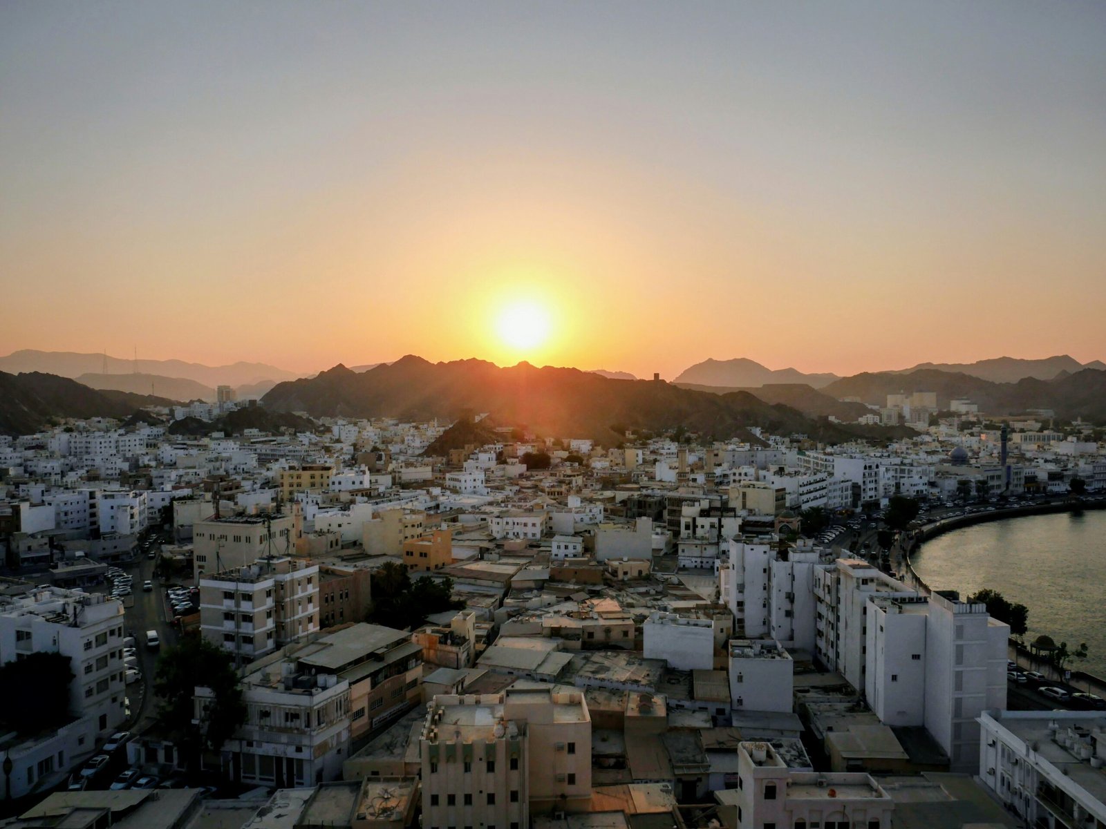 Muttrah harbor and waterfront in Muscat, Oman, representative image of the Omani port district discussing air and maritime links with Gwadar