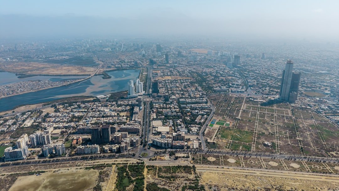 A Pakistani coastal city skyline with modern high-rises, representative image for Gwadar's Master Plan 2050 urban development targets