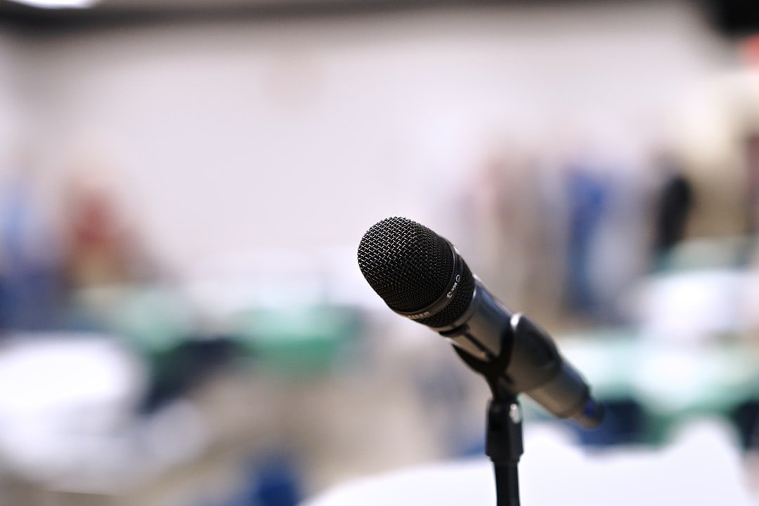 Microphones at a podium, a representative image of the political statements and press remarks made about placing Gwadar under federal control