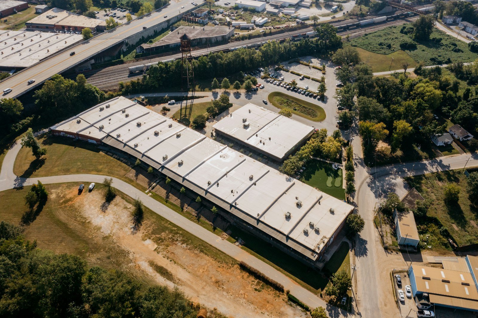 Aerial view of a modern industrial and office park complex, representative image for China's shift toward industrial and investment-driven cooperation under CPEC 2.0
