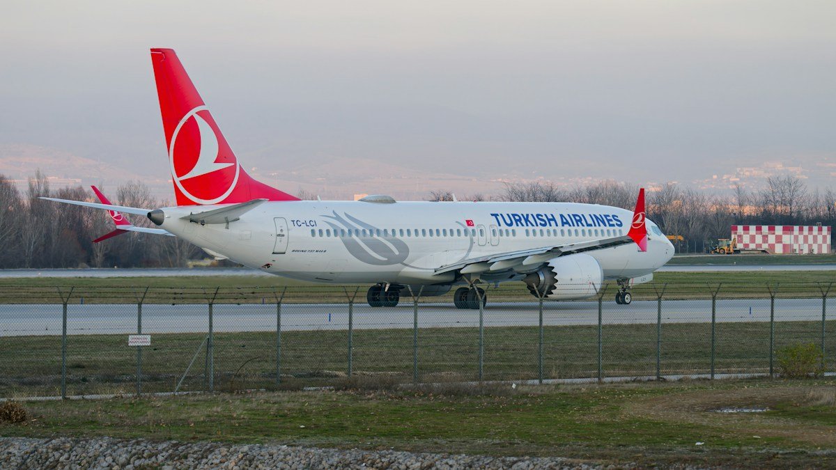 A commercial aircraft taxiing on an airport runway, representative of the scheduled flights now operating at New Gwadar International Airport