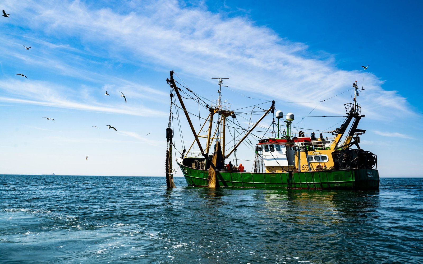 A fishing trawler at sea with its nets, illustrating the illegal trawling and prohibited-net concerns raised by Gwadar fishermen during the fisheries bill consultation