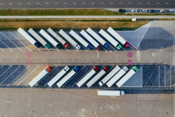 Trucks parked at a border crossing checkpoint, representative image for the Gabd-Rimdan transit trade route between Gwadar and Iran