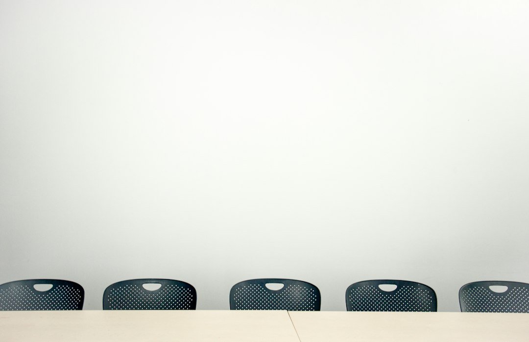 An official meeting room table set up for a panel discussion, representative image for the interview stage of the Gwadar police promotion process