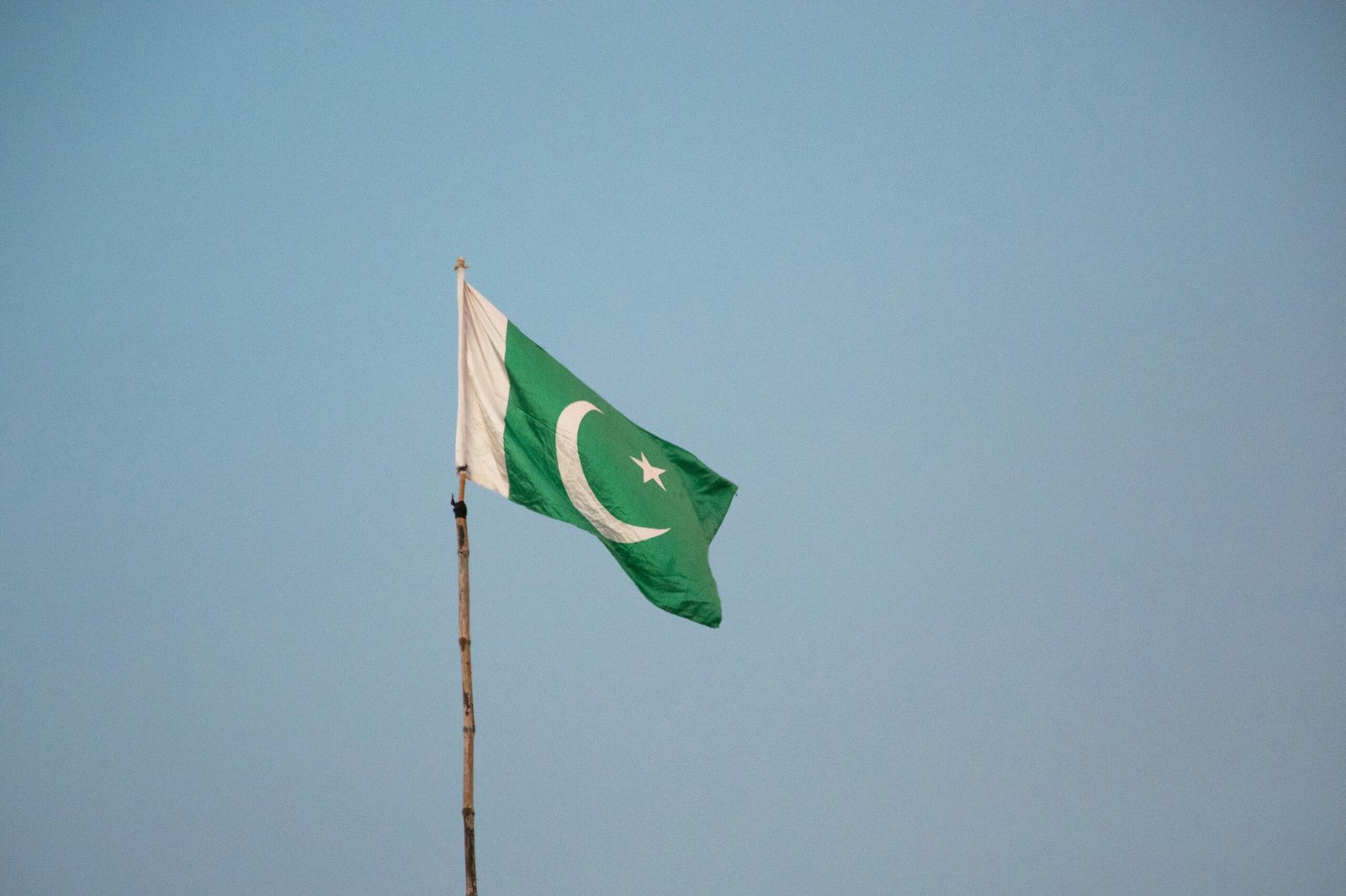 Pakistani flag, symbolizing the legislative process the Balochistan Fisheries and Aquaculture Bill 2026 must still pass through before becoming law
